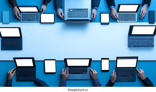 Teamwork Collaboration with Laptops and Tablets