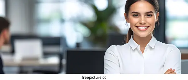 Smiling Woman In A White Shirt In An Office