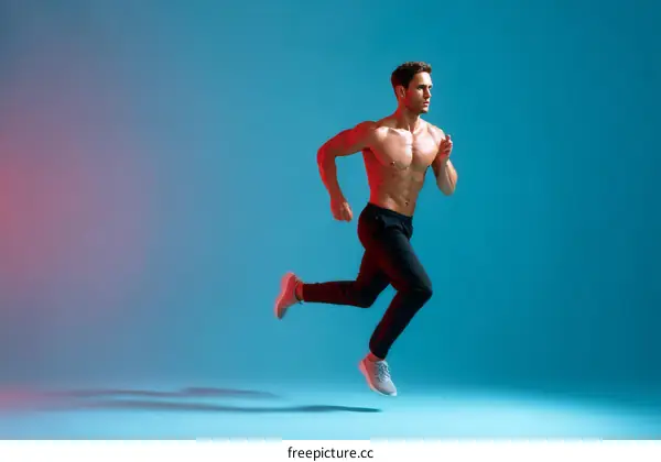 Muscular Man Running in Studio Light