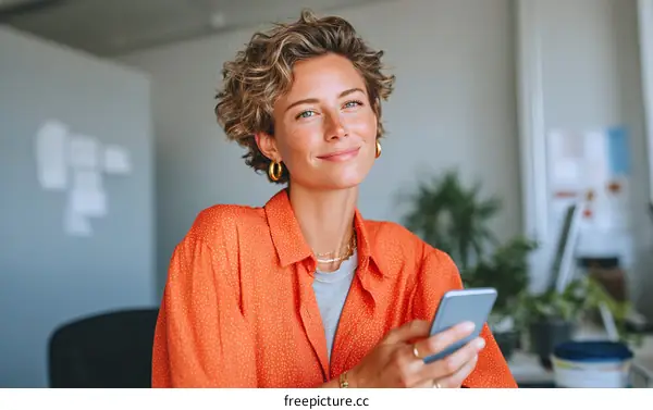Confident Woman Using Smartphone in Modern Office