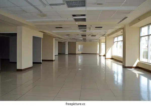 Empty Commercial Building Interior with Large Windows