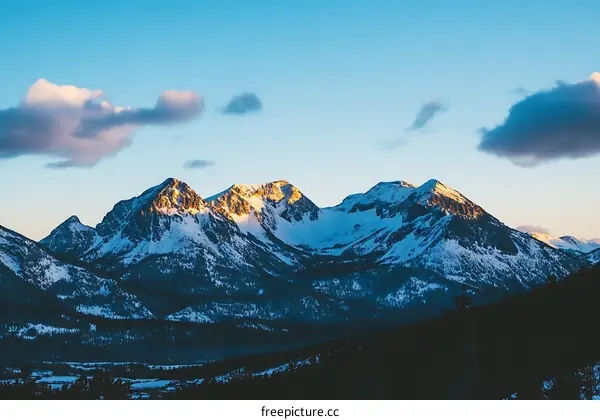 Snow Covered Mountain Range in the Sunset