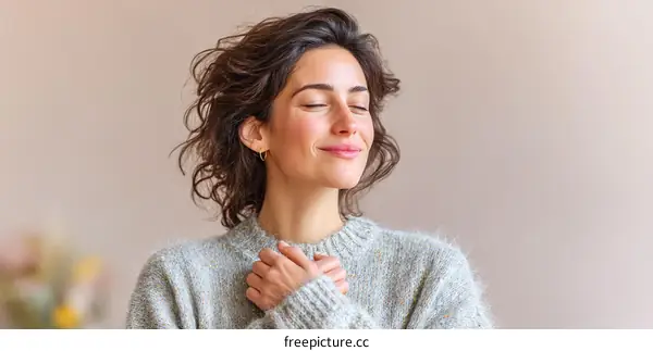 Woman in a relaxed pose with peaceful expression