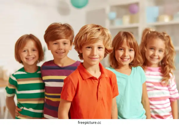 Happy Children Smiling in a Row