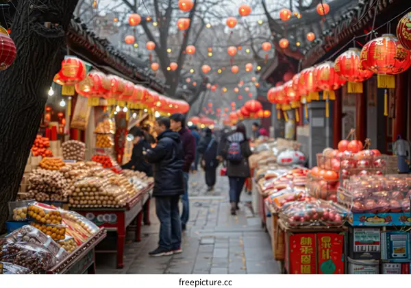 A bustling market street in Beijing with people shopping for Chinese New Year