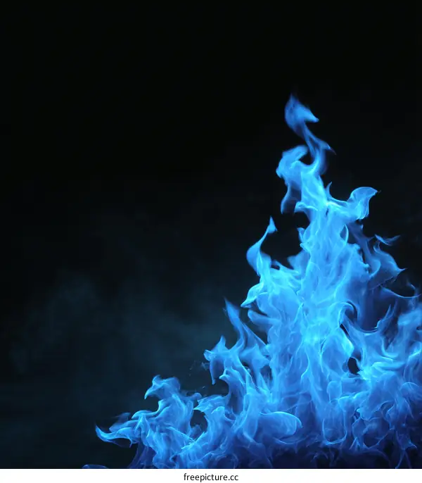 Abstract Blue Flame Against Black Background