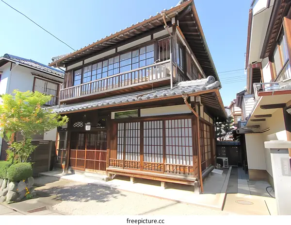 Traditional Japanese House with Wooden Structure and Shoji Screens
