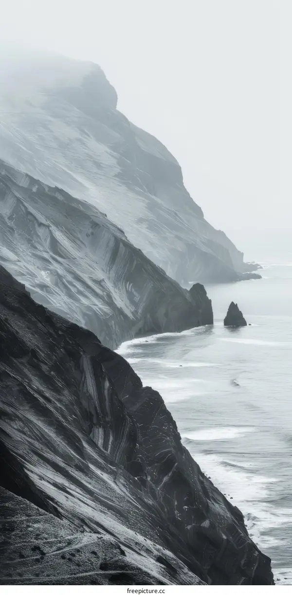 Dramatic Black and White Photo of a Rocky Coastline