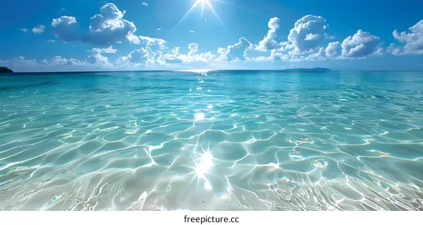 clear water and white sand beach with bright sunshine