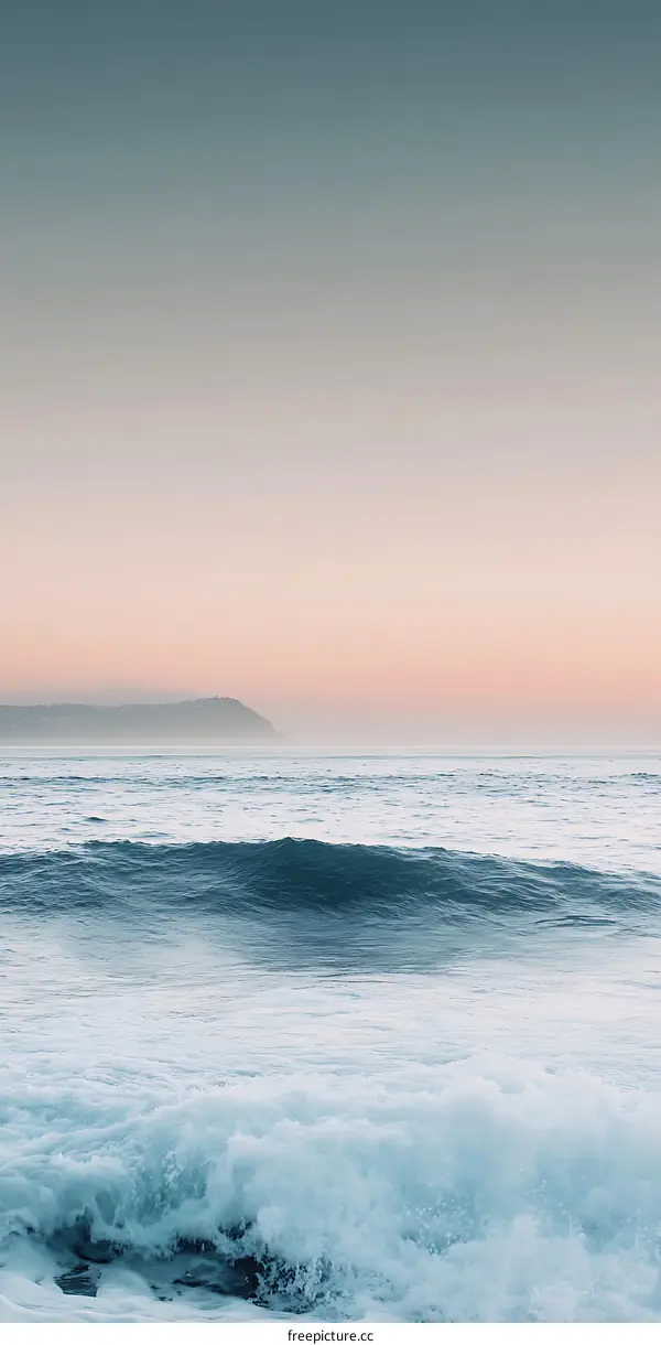 Ocean Waves Crashing on the Shore at Sunset