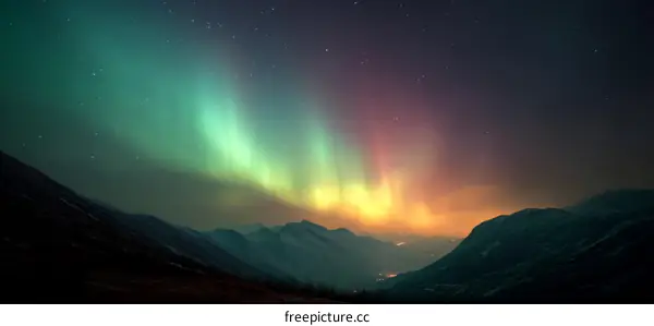 Aurora Borealis over Mountainous Landscape