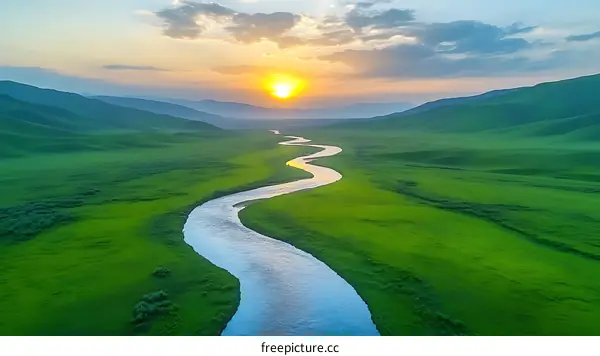 Sunrise over a Winding River Valley