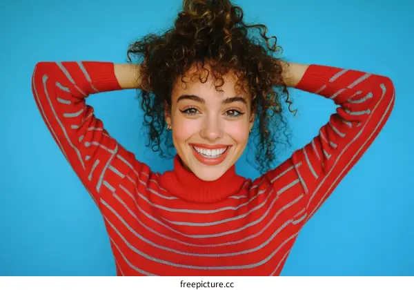 Happy Woman Wearing a Red and Gray Striped Sweater