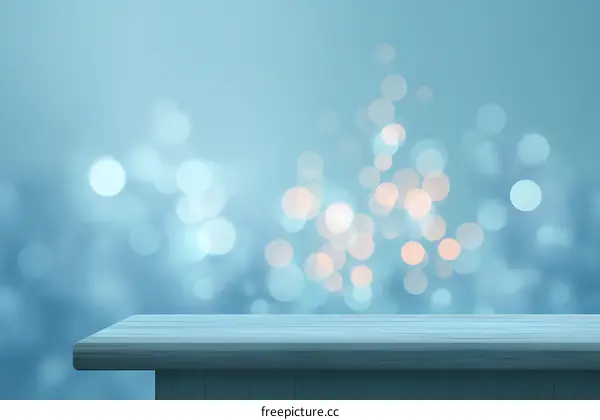 Empty Wooden Tabletop Against Blue Bokeh Background