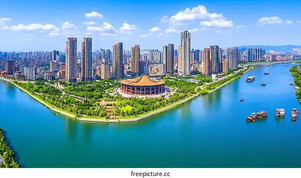 Panoramic Cityscape with River and Buildings