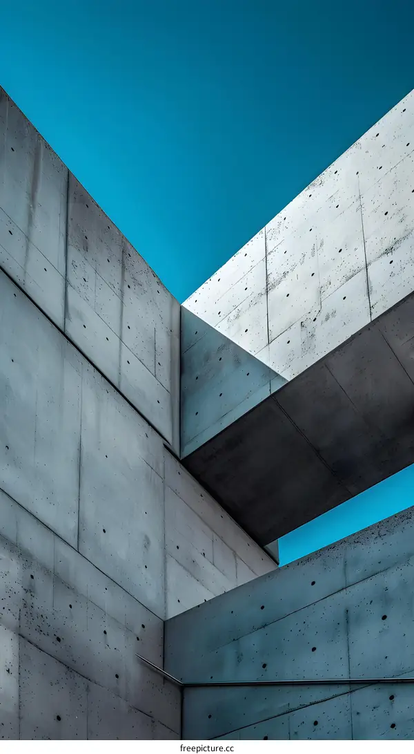 Minimalist Concrete Architecture Design with Blue Sky Background