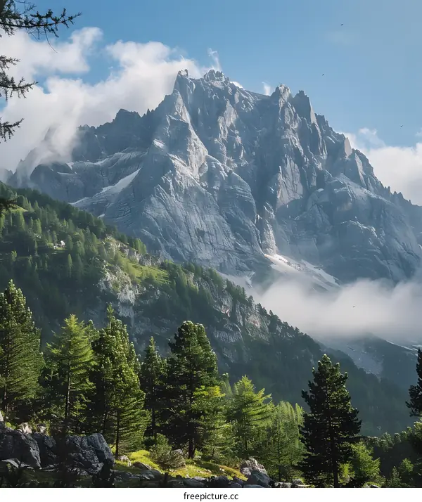 Majestic Mountain Landscape with Fog and Clouds