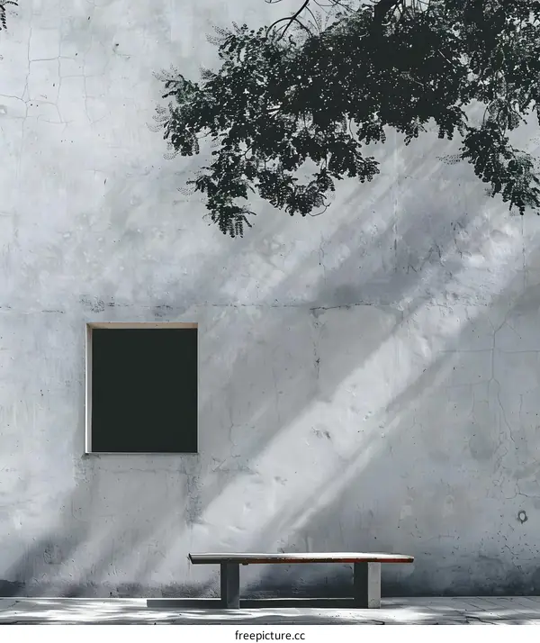 Minimalist Concrete Wall with a Window and a Wooden Bench