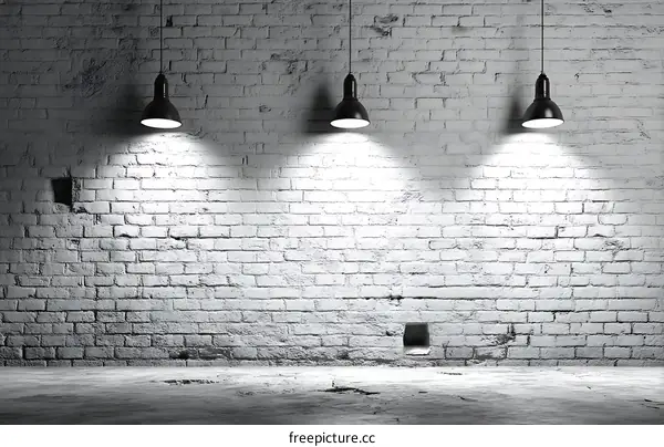 Empty Room with Brick Wall and Pendant Lights