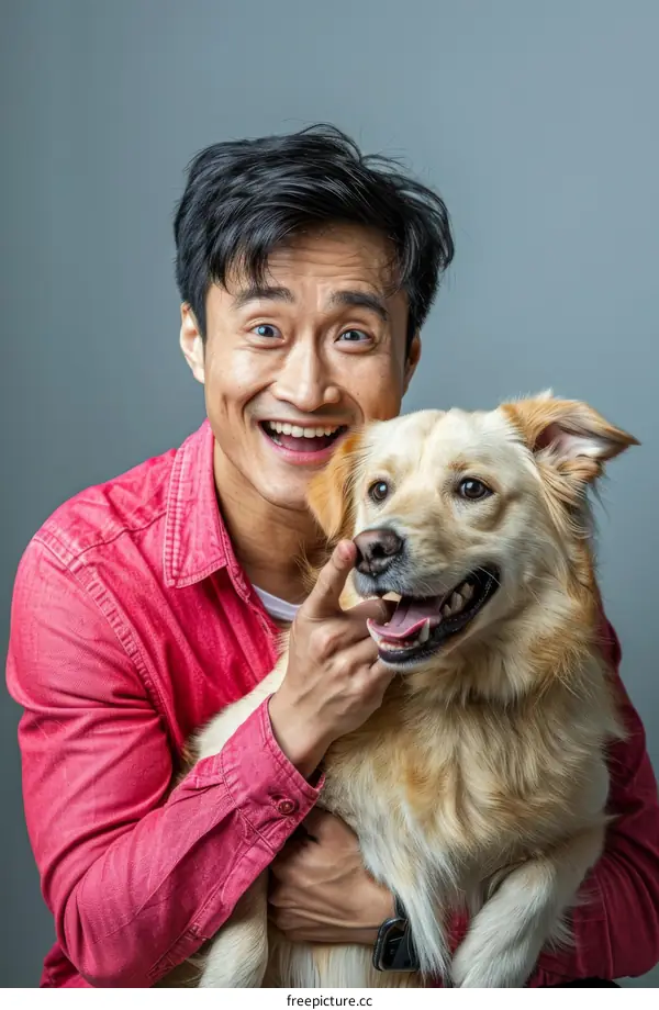 Portrait of a young Asian man with his dog