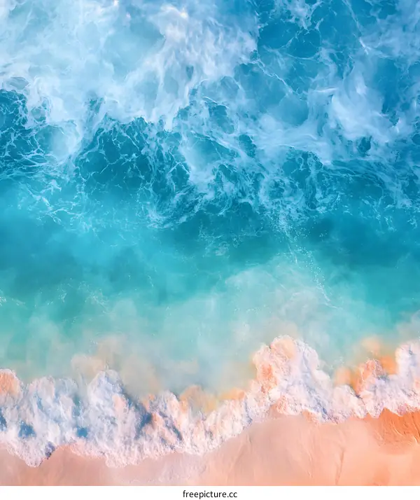 Aerial View of Ocean Waves Crashing on Sandy Beach