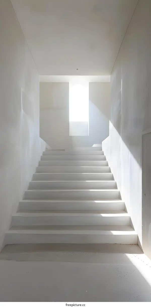 White Stairs Leading Up to a Window with Sunlight