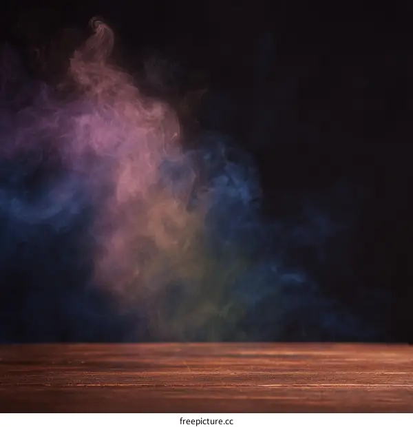 Colorful Smoke Clouds on Wooden Tabletop Background
