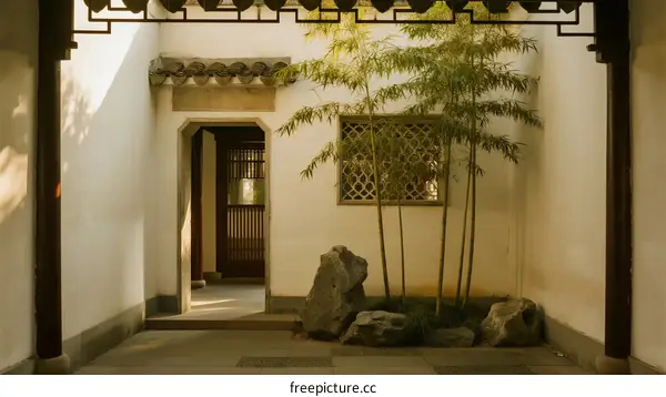 Traditional Chinese Garden Courtyard with Bamboo and Stones