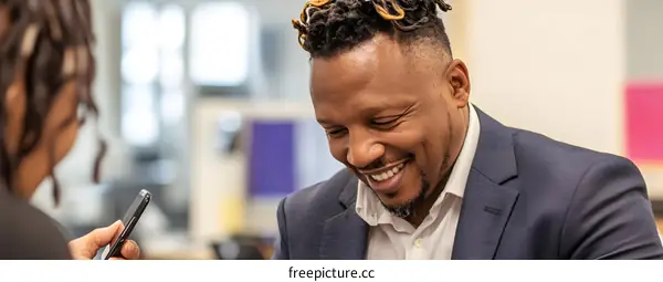 African American Man Smiling In A Meeting