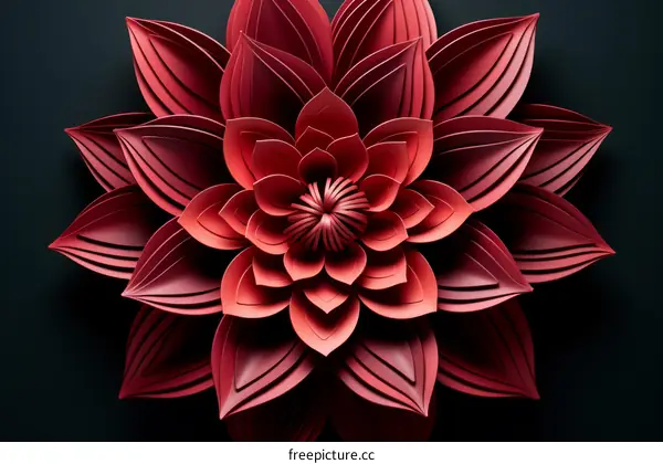 Red paper flower with dark background
