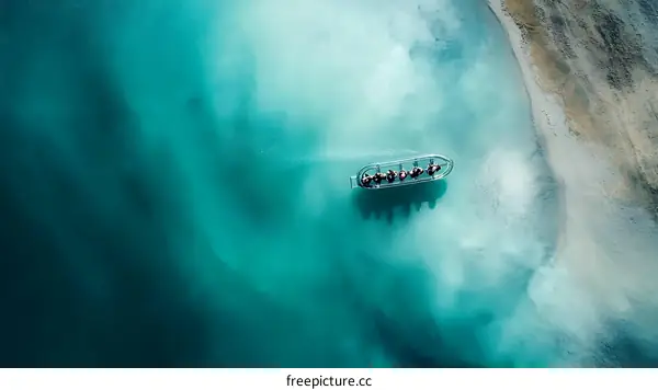 Aerial View of a Boat on Turquoise Water