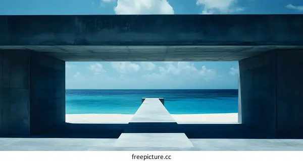 Concrete Structure Framing a View of a Tropical Beach with Blue Sky and Ocean