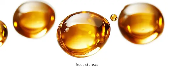Golden Liquid Droplets Close-up