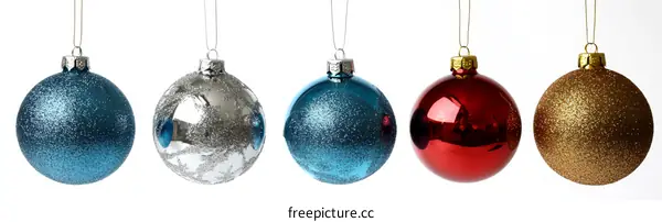 Four Christmas Ornaments on White Background
