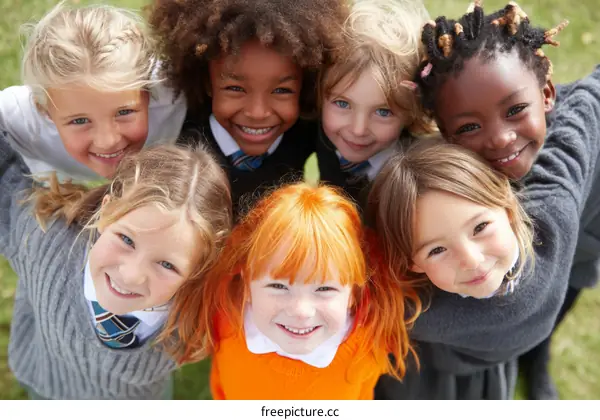 Diverse Children Embrace Friendship Outdoors