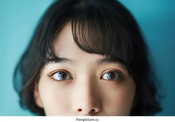 Close Up Portrait of Asian Woman with Brown Eyes