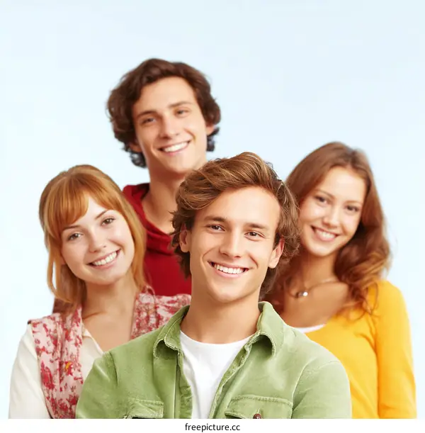 Four Smiling Young People Together