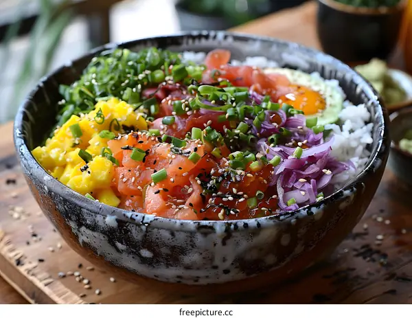 Colorful Hawaiian Poke Bowl with Salmon, Tuna, Mango and Avocado