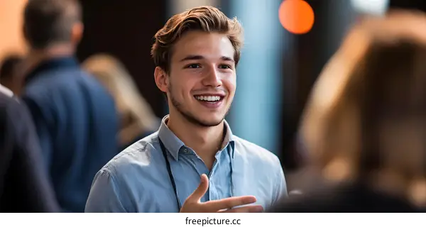 Smiling Caucasian Man Talking at Business Conference