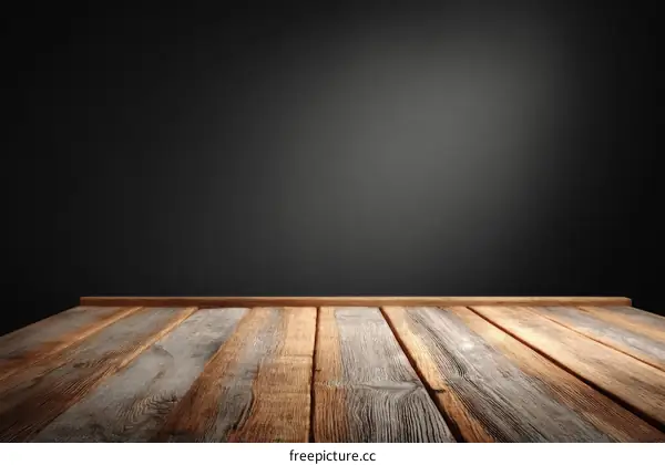 Wooden Tabletop Against Dark Background