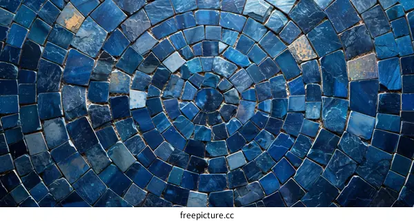 Blue Mosaic Tiles Arranged in a Circular Pattern