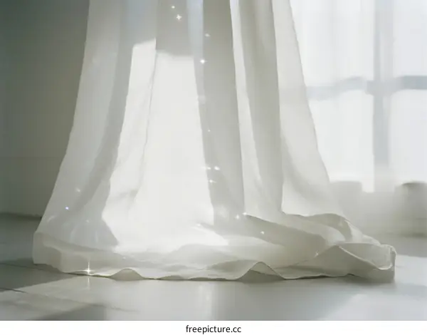 Soft White Curtain Fluttering with Light and Shadow in Room