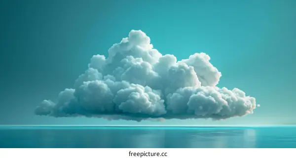 Fluffy white cloud floating over blue ocean