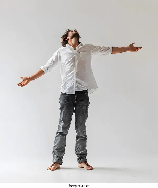 Ecstatic man with arms outstretched