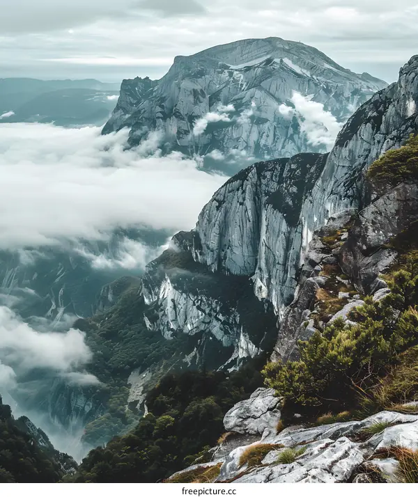 Mountain Range with Clouds and Fog