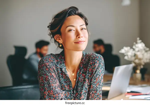 Confident Asian Woman in a Stylish Office Setting