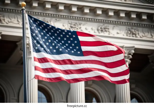 American flag waving in front of a government building