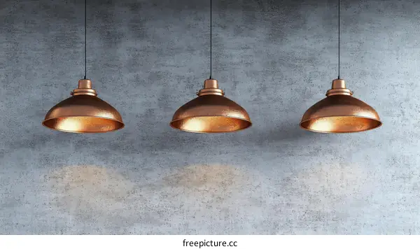 Copper Pendant Lights on Concrete Wall