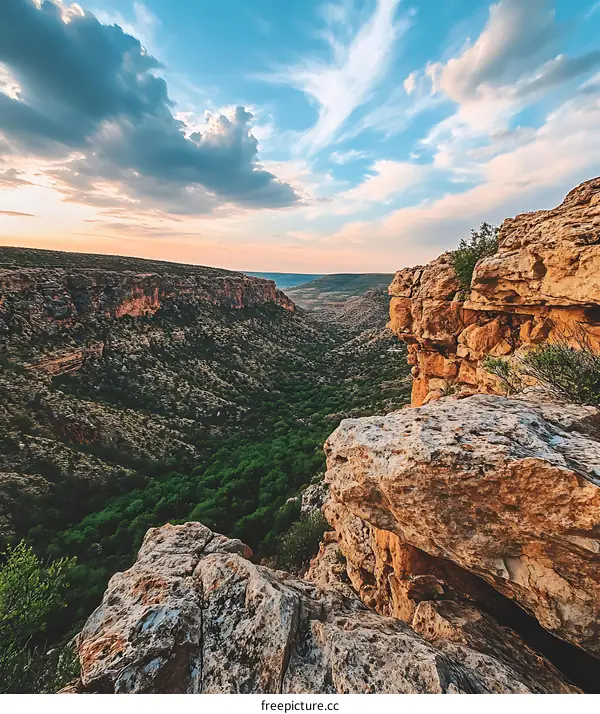 Sunset View from Clifftop Overlooking Canyon Landscape