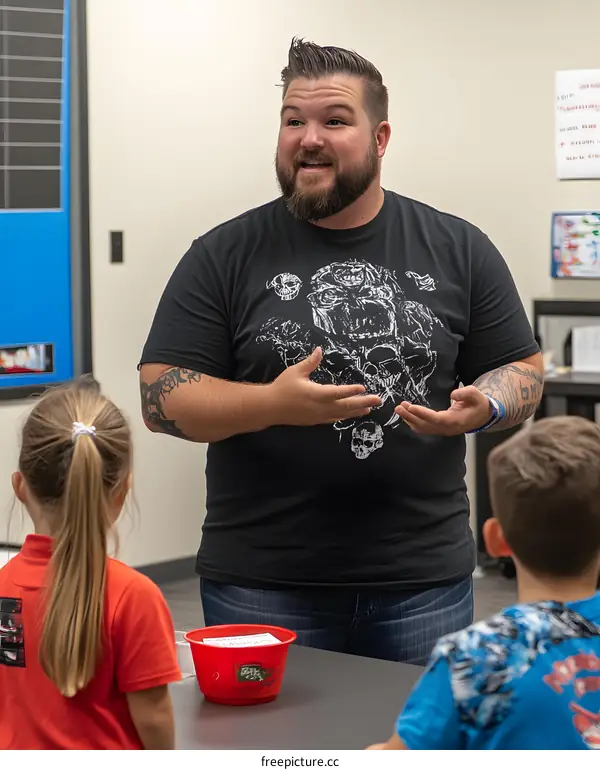 Man Talking to Kids During Class Activity